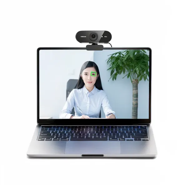 Webcam USB Full HD 1080p AKKHOO avec microphone intégrée installée sur un ordinateur portable affichant une femme en visioconférence